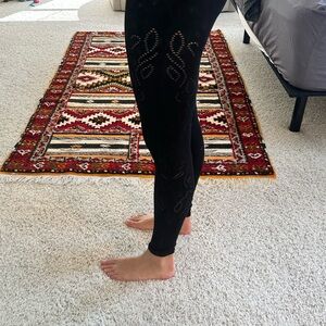 Black Leggings fabletics with laser cut patterns